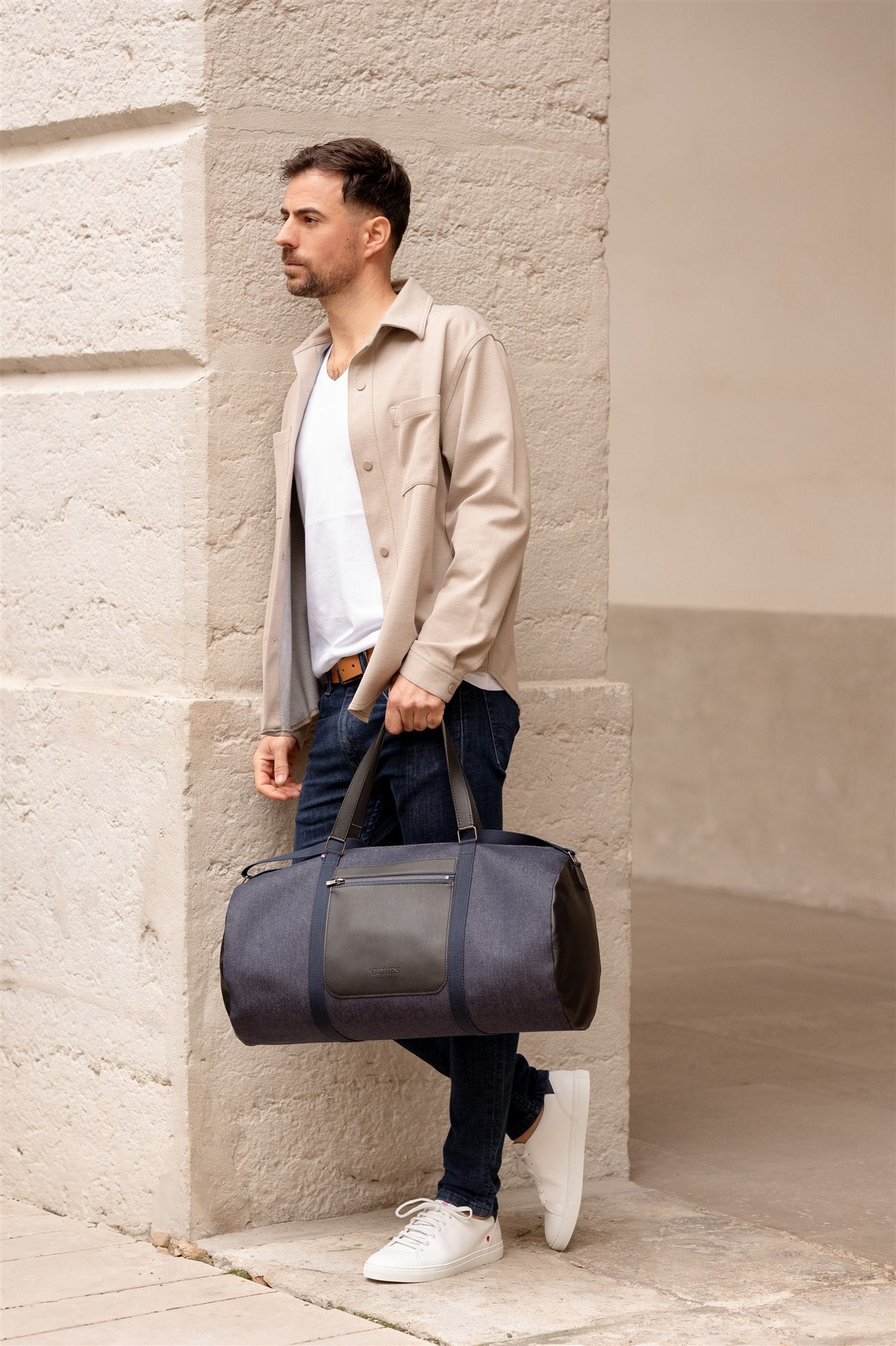 sac polochon porté main en jeans