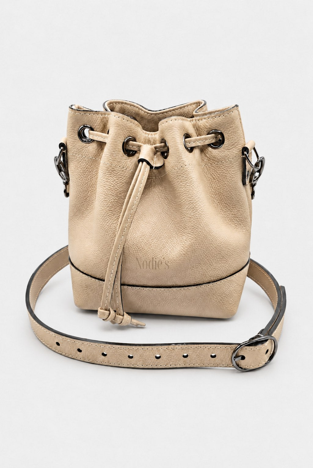 Sac seau cuir beige grainé - تومي - كريمة حصوية محببة